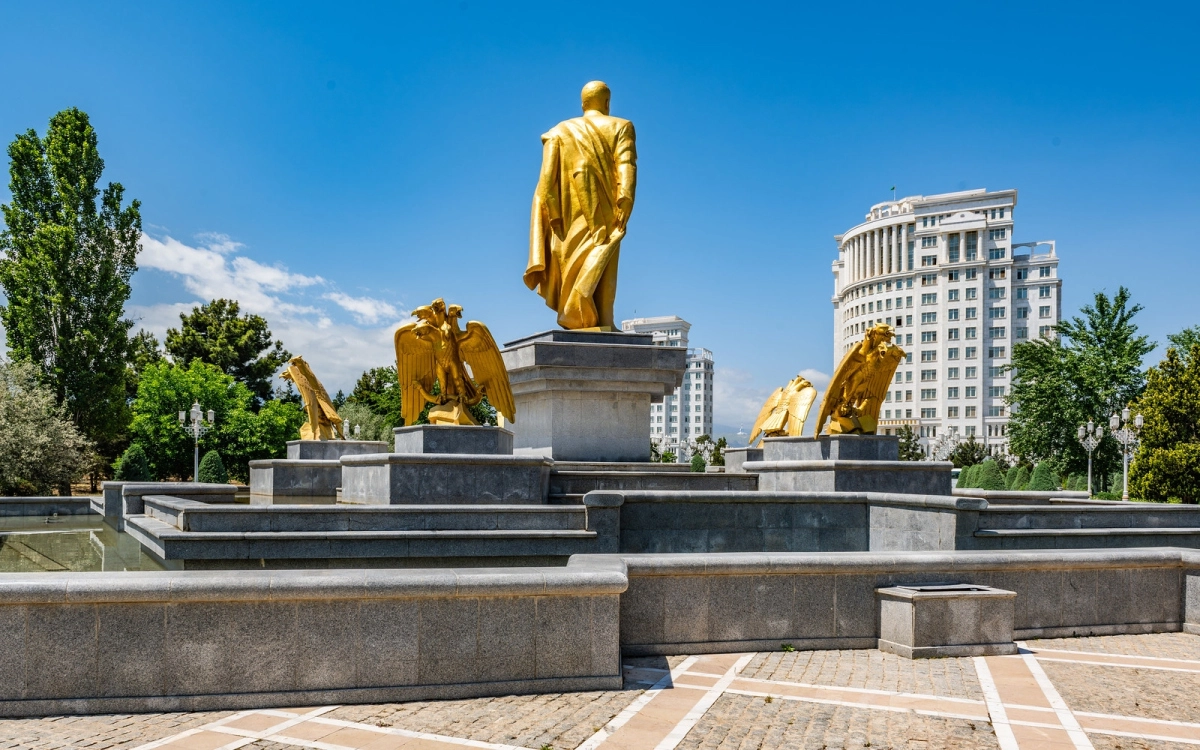 Golden monument and white-marble architecture in Ashgabat, Turkmenistan
