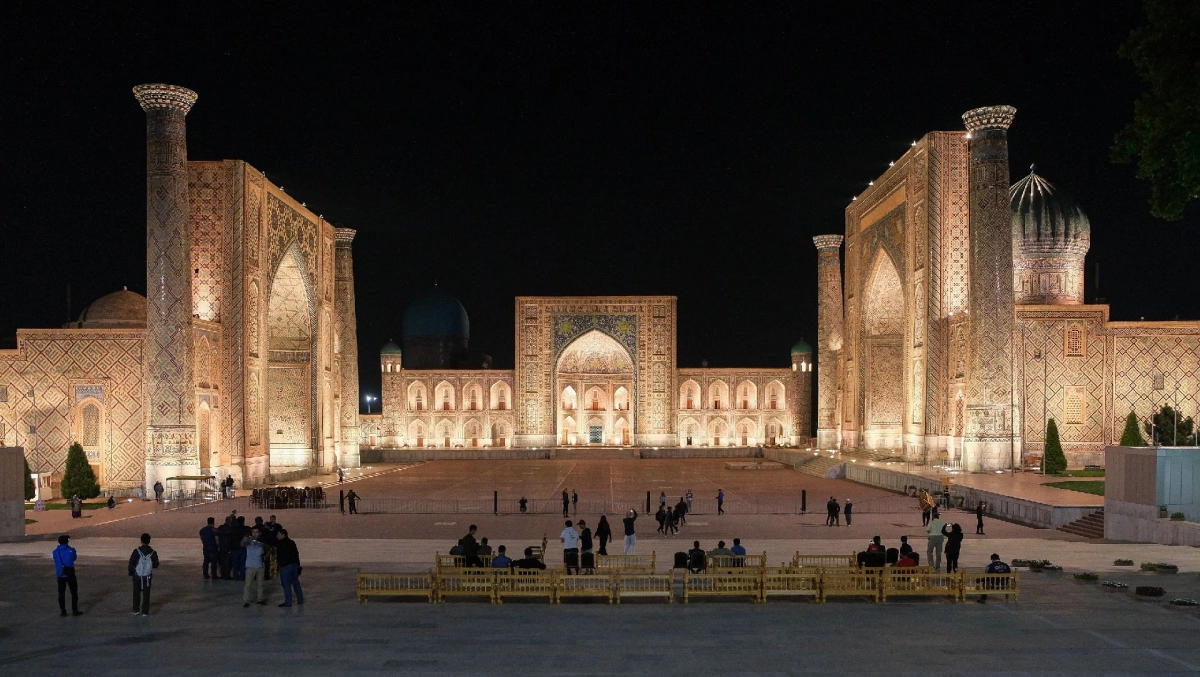 Registan Square illuminated at night in Samarkand