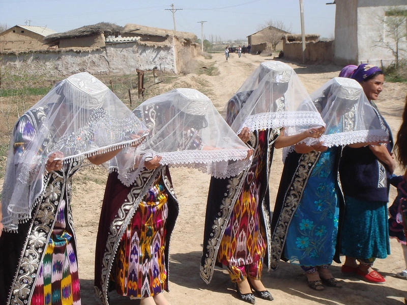 People in traditional clothing during a spring celebration in Uzbekistan
