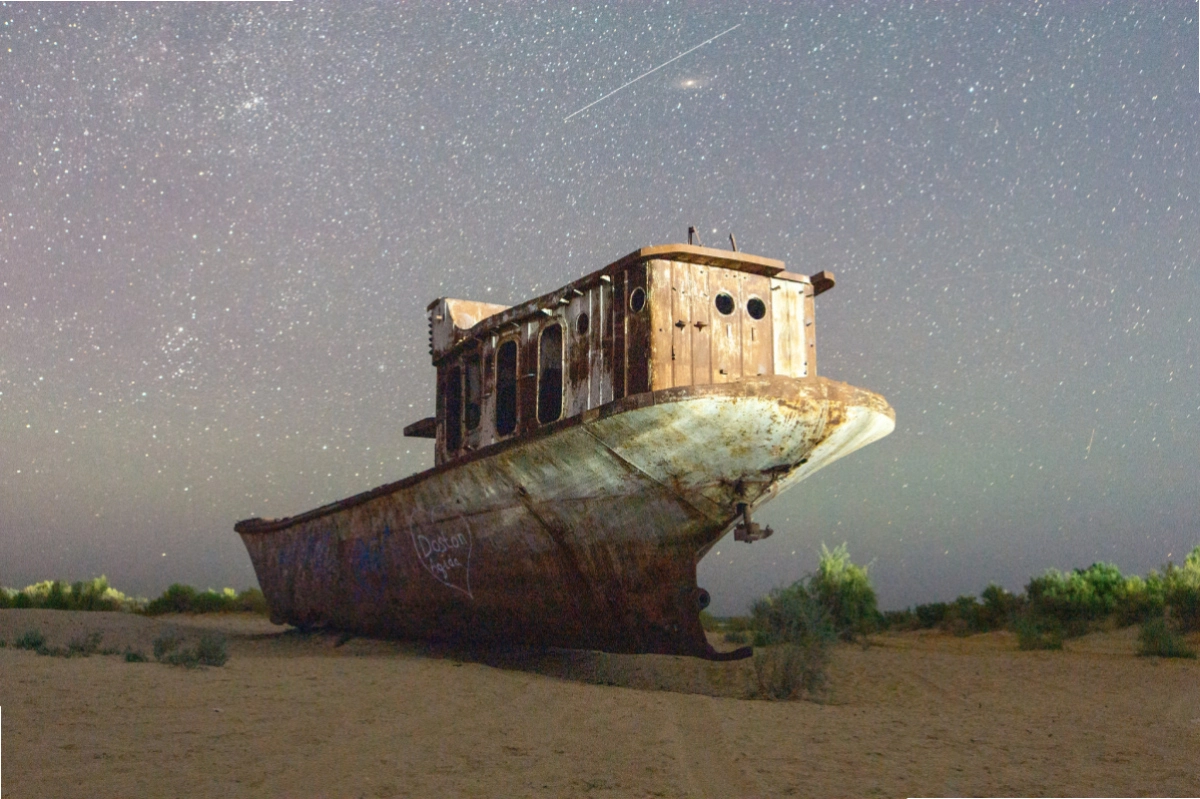 Ship on the former Aral Sea bed in Muynak at night
