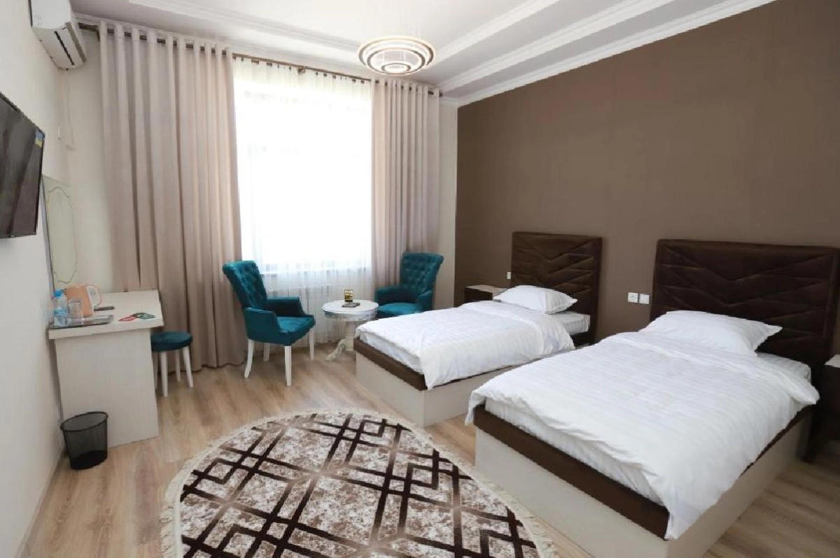 Светлый номер Twin в Panjakent Plaza Hotel с двумя отдельными кроватями