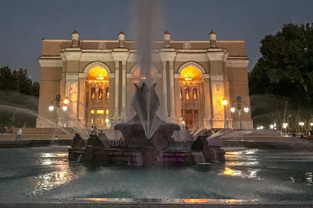 Fountain in front of the Alisher Navoi Opera and Ballet Theatre in the evening