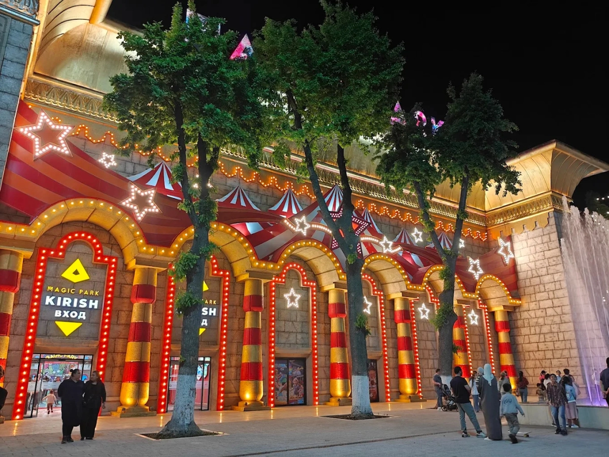 Illuminated entrance of Magic Park in Tashkent at night