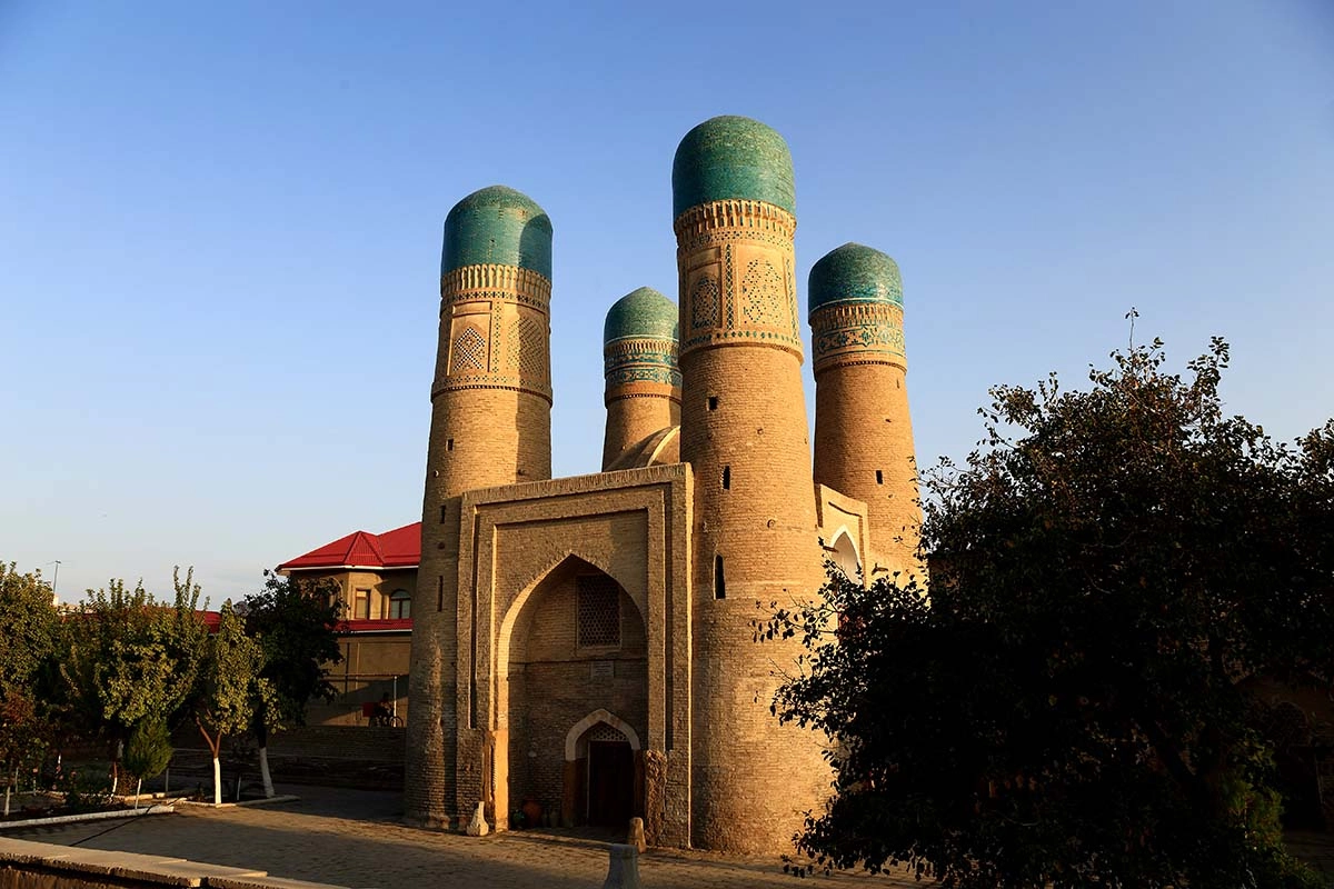 Chor Minor in Bukhara with four towers and blue domes