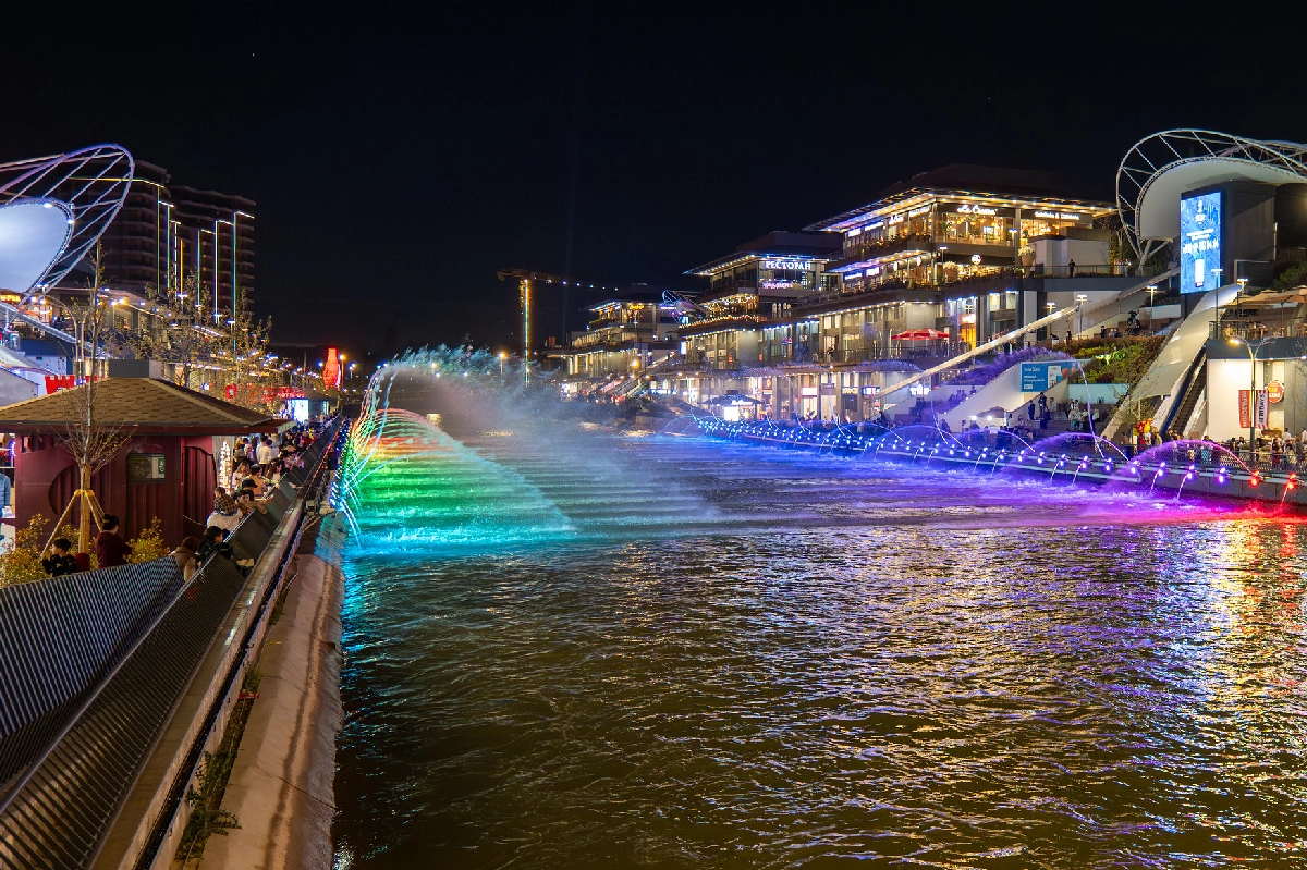 Colorful fountains and an evening waterfront area in Tashkent