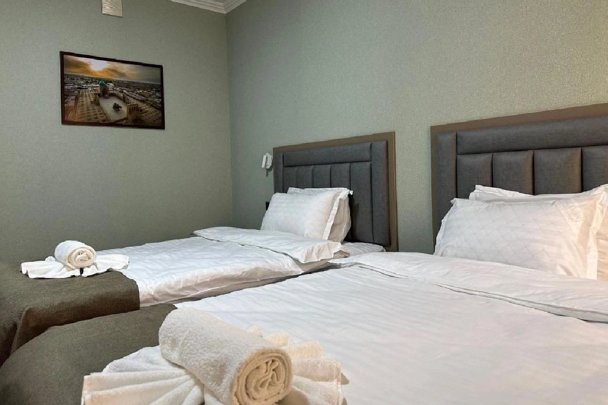 Zimmer mit zwei Einzelbetten — Reikartz Grand Kokand