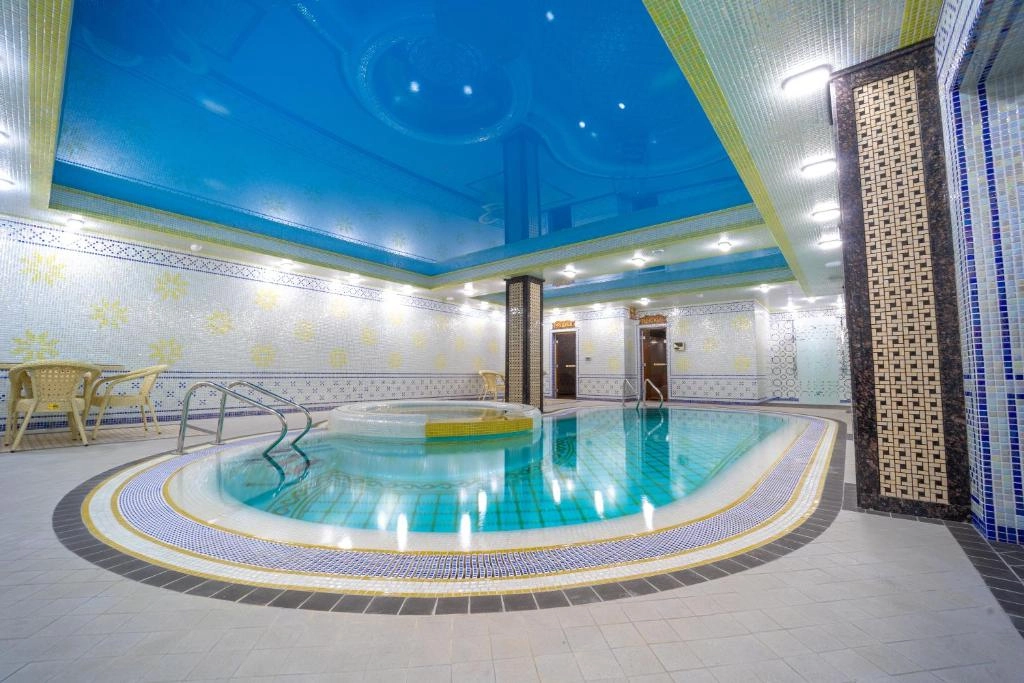 Indoor pool at Shohjahon Palace Hotel & Spa