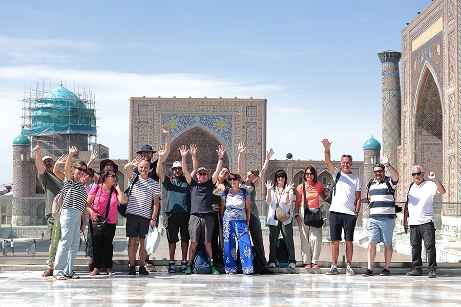 Tourist at Registan Square during our Uzbekistan Tour from the USA