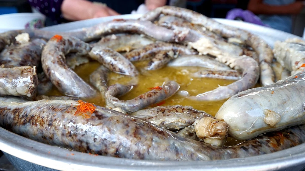 Khasyp sausage on a large metal tray