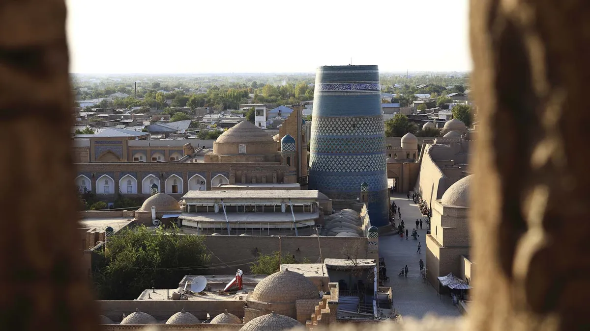Khiva UNESCO Ichan-Kala at sunset — highlight of the Guaranteed Uzbekistan tour