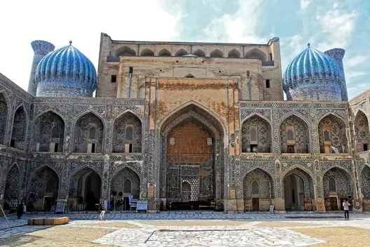 Madrasa courtyard with blue domes at Registan Square