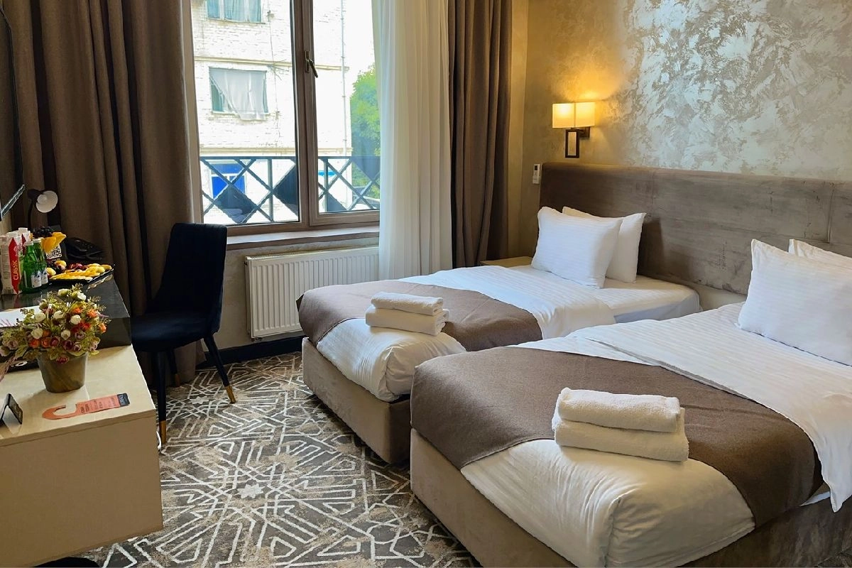 Zimmer mit zwei getrennten Betten im Florence Boutique Hotel in Taschkent