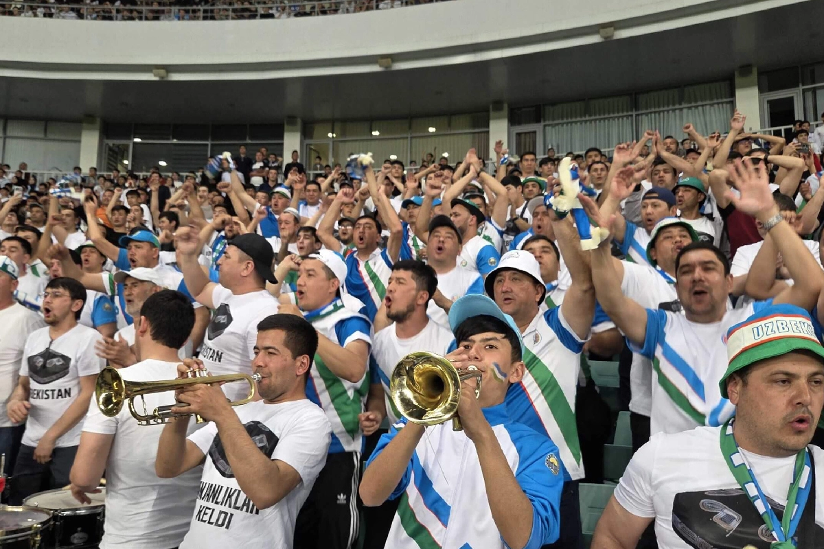 Uzbekistan supporters cheering in the stands