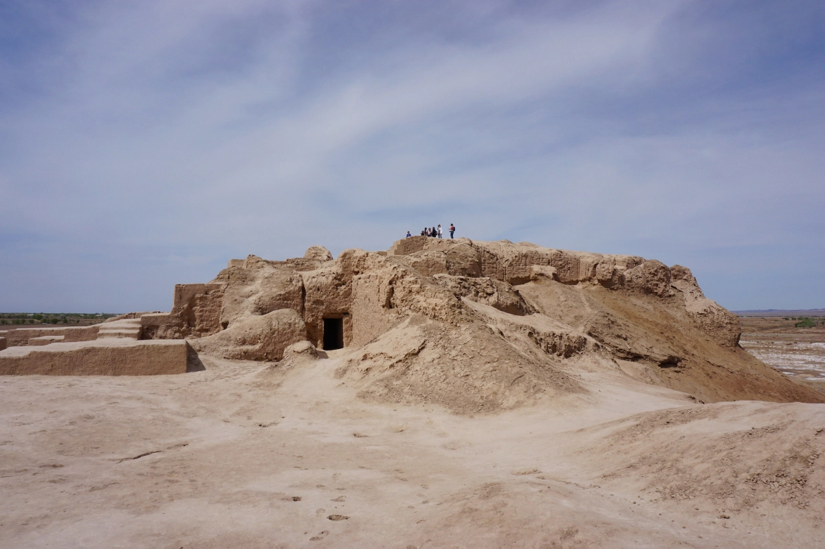 Raised ruins at Toprak-Kala Visitors above the raised mud-brick remains at the Toprak-Kala archaeological complex