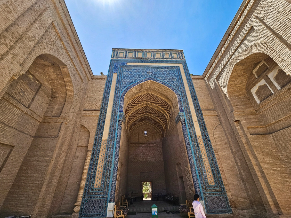 Sultan Saodat portal in Termez Tall portal of the Sultan Saodat memorial ensemble in Termez with blue tilework and brick arches