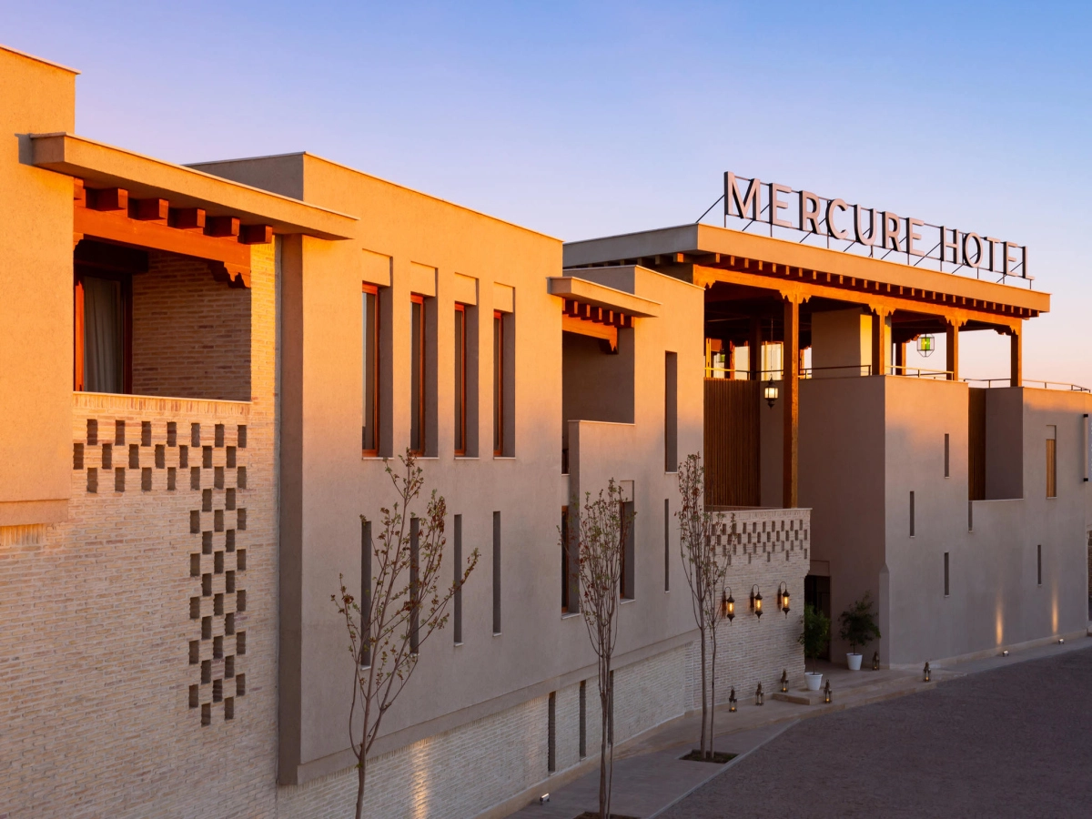 Exterior of Mercure Bukhara Old Town in warm evening light