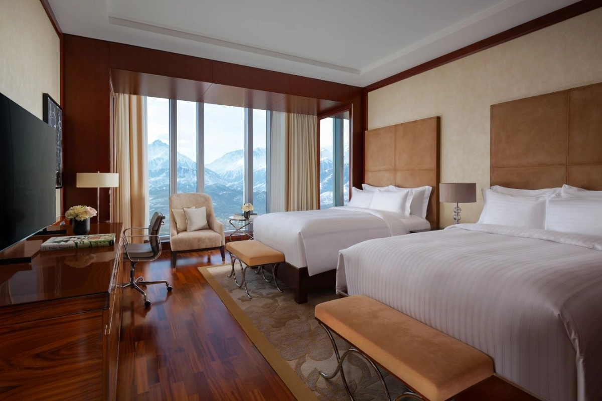 Deluxe room with two double beds at The Ritz-Carlton, Almaty