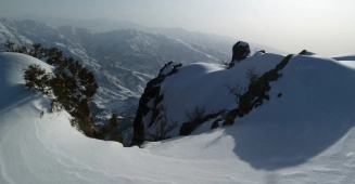 Snowy slope and mountain view